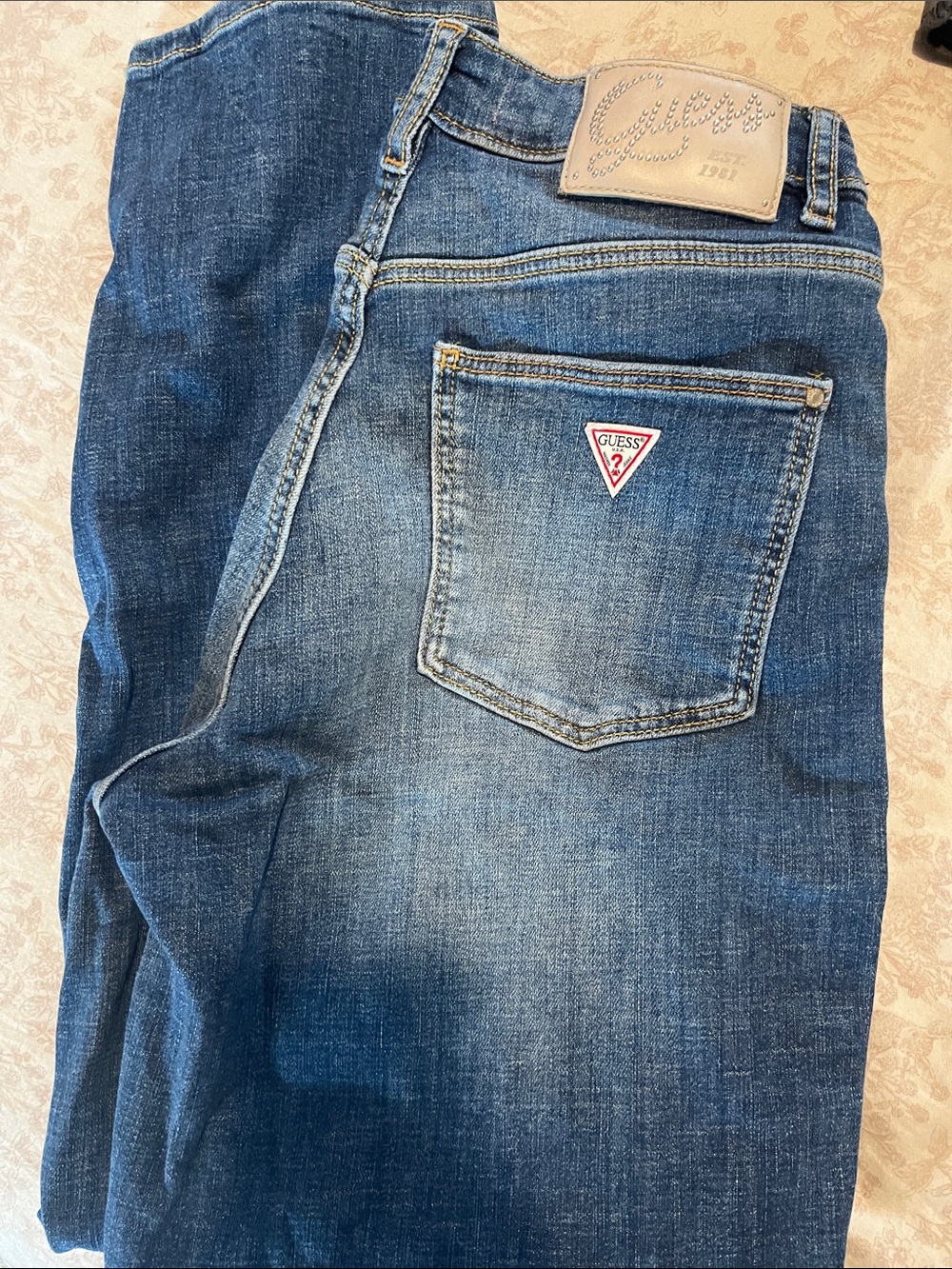 GUESS Women’s Faded Blue Denim Jeans with Logo Patch